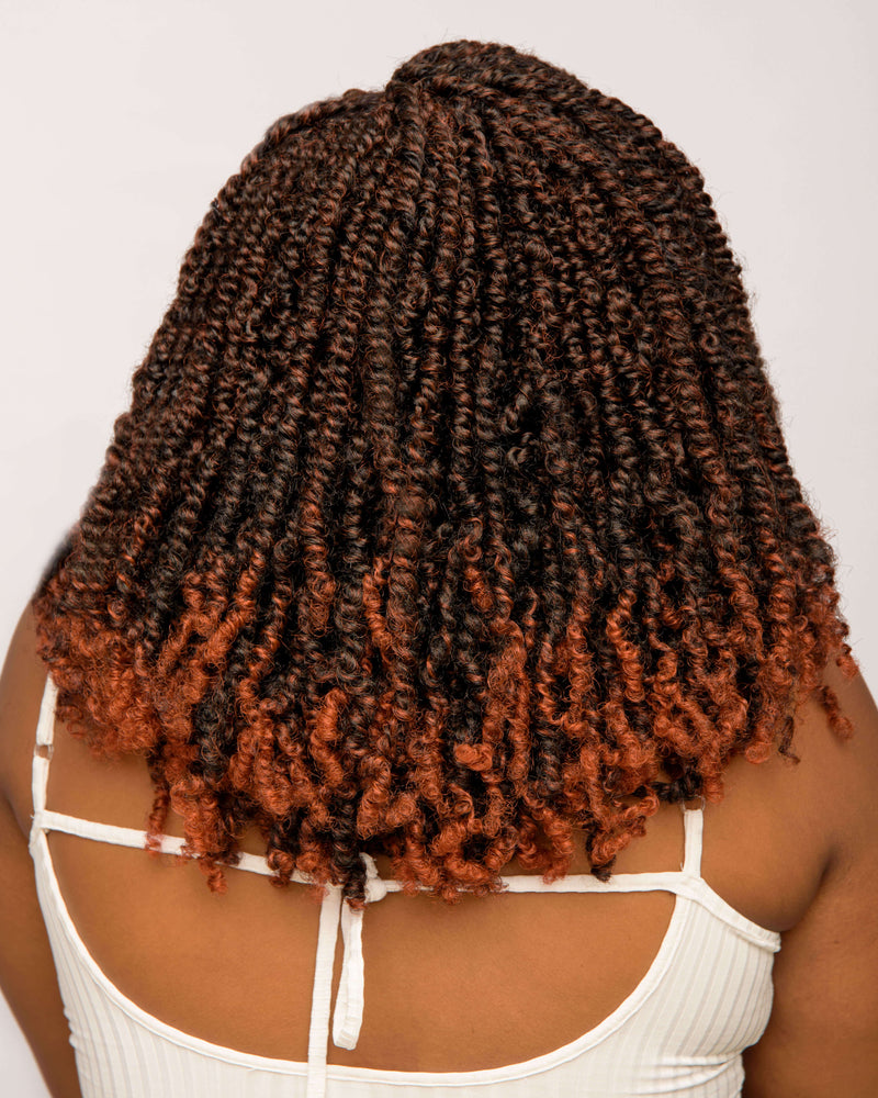 Back view of model in Spring Twists - Natural Girl Wigs